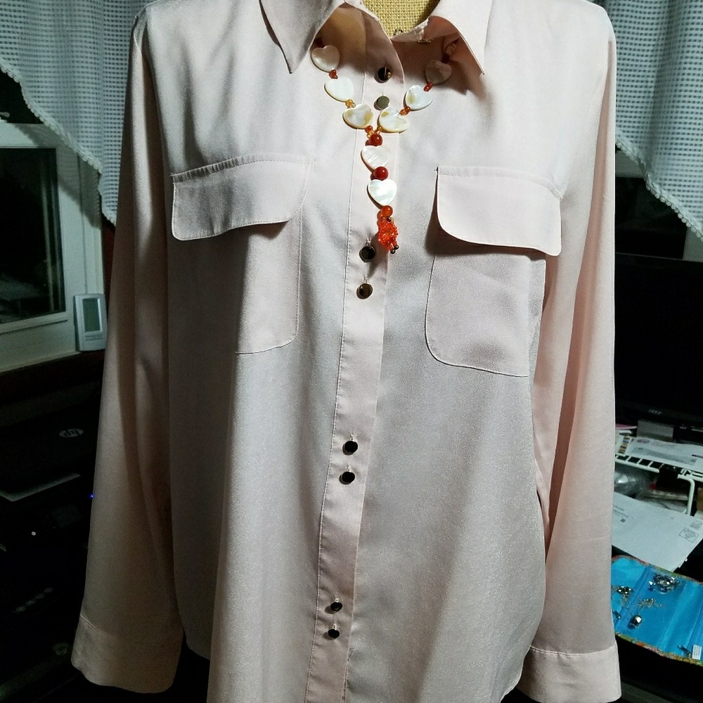 Ivanka Trump peach blouse